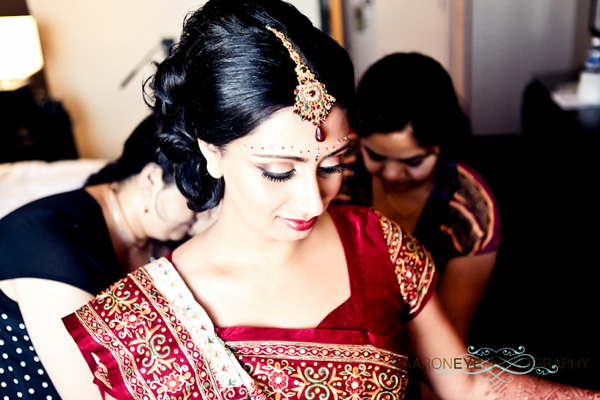 An Indian bride prepares for a modern Indian wedding.