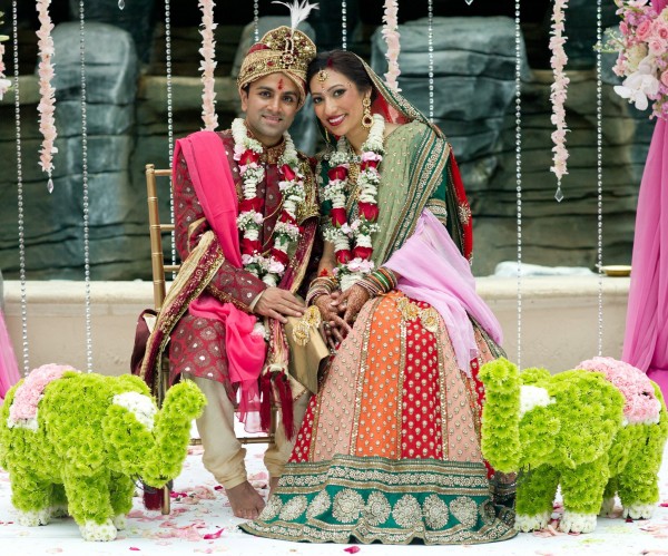 An Indian bride and groom at their modern Indian wedding ceremony.