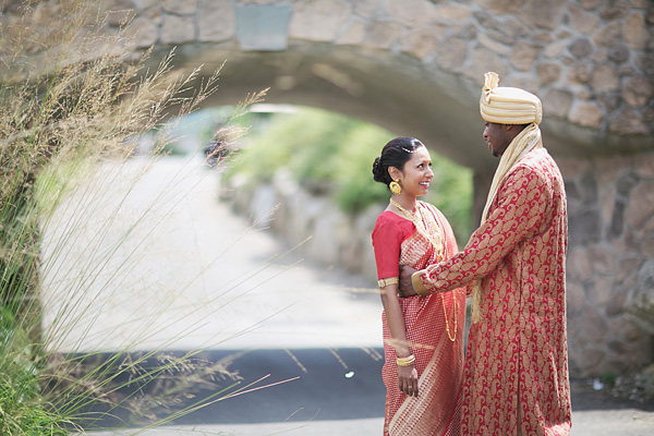 A groom gets the first look of his Indian bride.