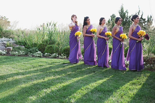 Bridesmaids wear a purple bridal sari for this fusion Indian wedding.