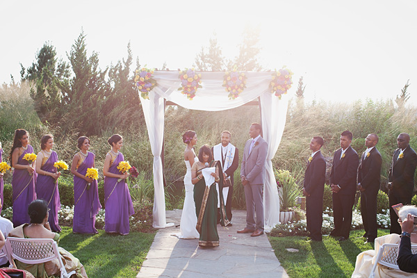 An Indian bride and groom celebrate at this fusion Indian wedding.