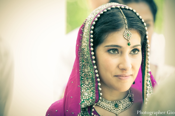 Sikh Indian bride in an Indian jewelry set in diamonds and emeralds.