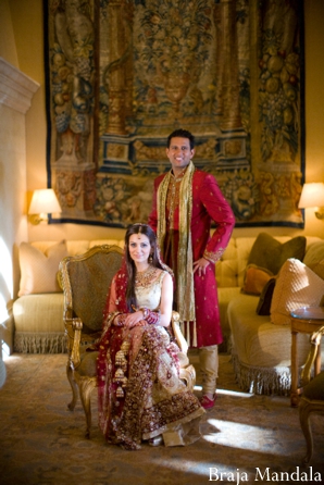 indian bride and groom wedding portrait inside resort hotel.