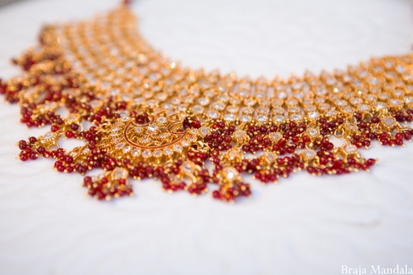 Bridal indian wedding jewelry in red and gold.