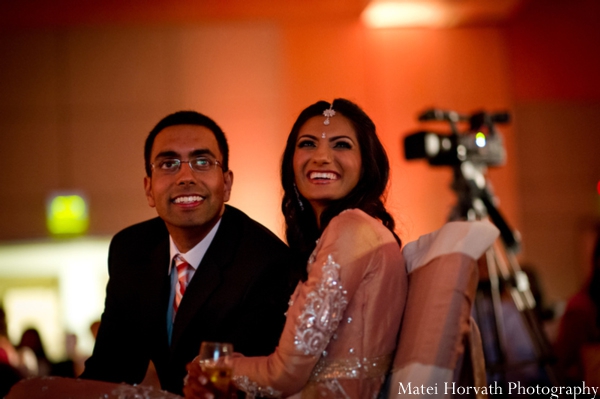 An Indian bride and groom at their modern Indian wedding reception.