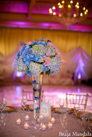Indian wedding reception centerpiece of hydrangea flowers.