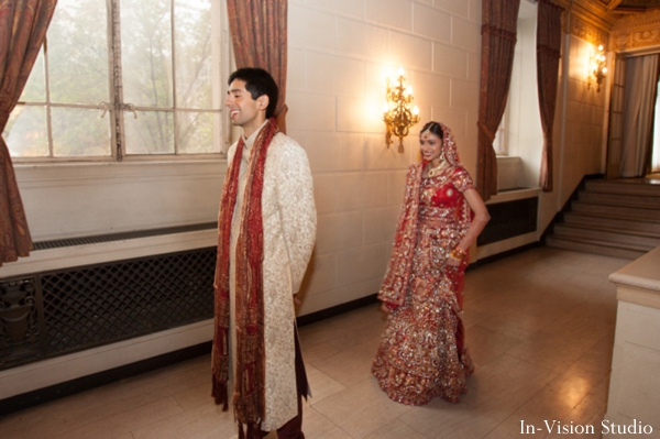 Indian bride and groom at their first look photos
