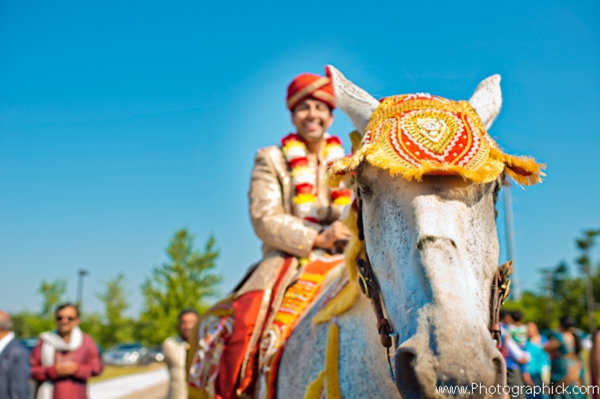 Indian groom on indian wedding day in a baraat.