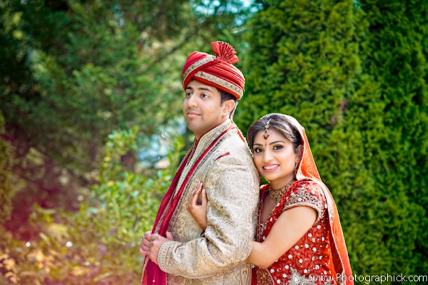 indian bride and groom in their indian wedding portraits.