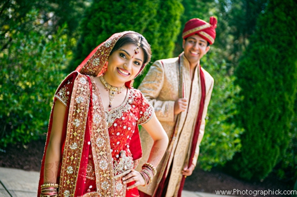 Indian bride and groom in indian wedding day portrait.