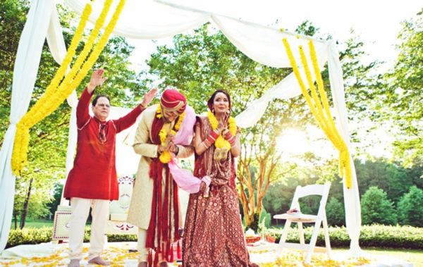 indian bride and groom at their indian wedding ceremony.