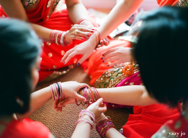 Indian bridal party put on traditional indian wedding jewelry