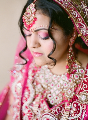 Indian bridal hair and makeup ideas for a pink wedding.