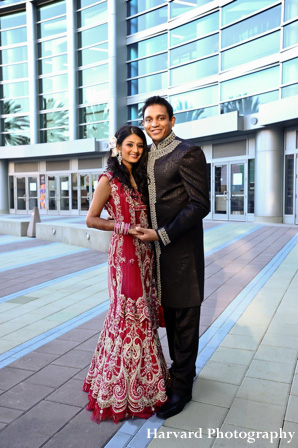 Indian bride in pink bridal lengha.