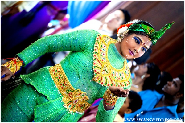 Indian wedding entertainment with peacock dancers